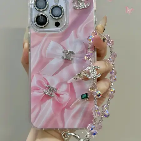 シャネル iphone18/18pro ケース リボン 付き 高透明 ダイヤ柄 ココマーク 手持ちストラップ 落下防止 ピンク ケース