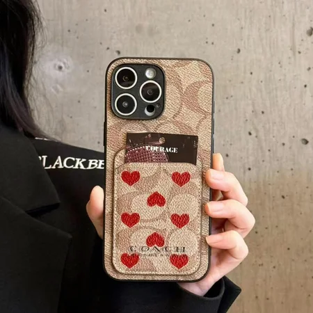 コーチ iphone18pro帯ケース ハート柄