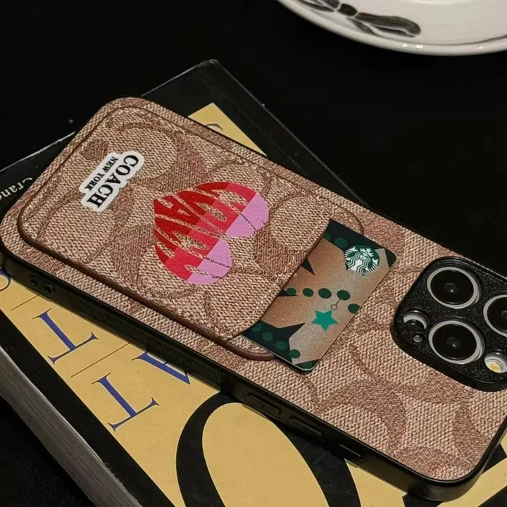 コーチ iphone18proケース レンズ保護