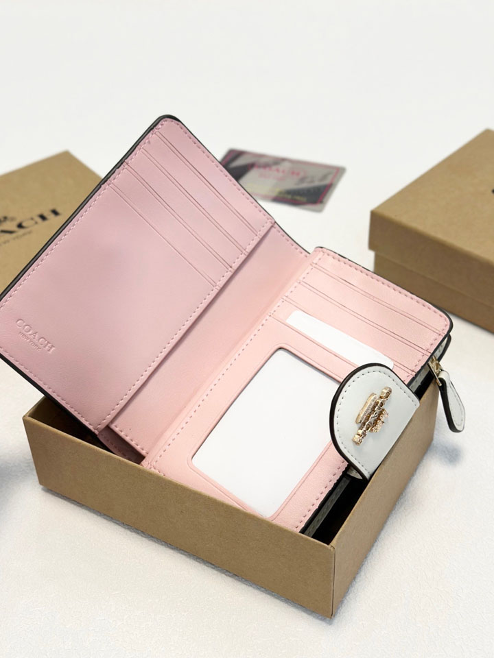 COACH 二つ折り財布 レディース