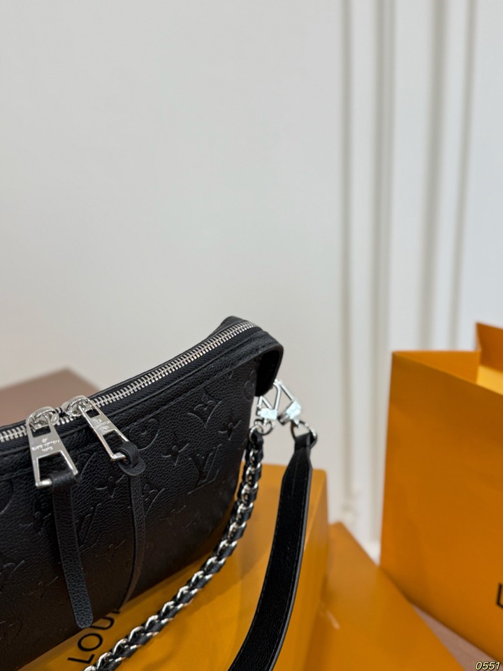 Louis Vuitton Hand It All bag
